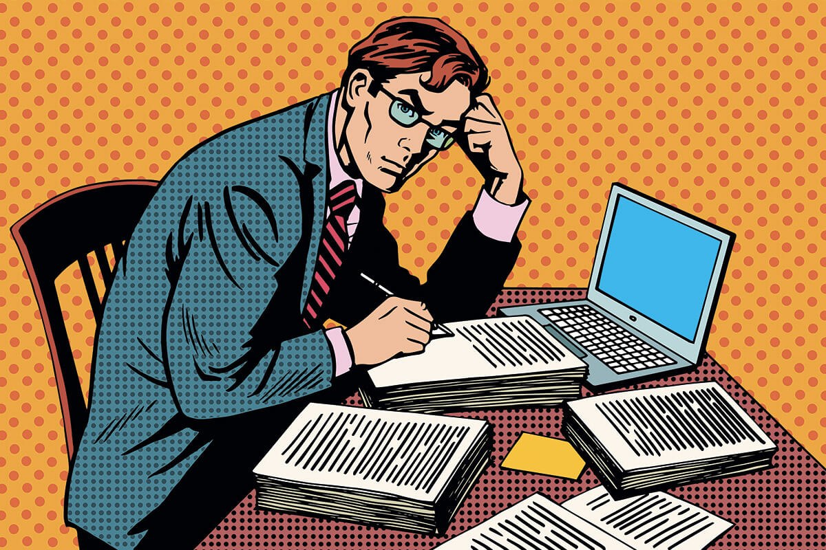 Thoughtful writer writes his work on paper