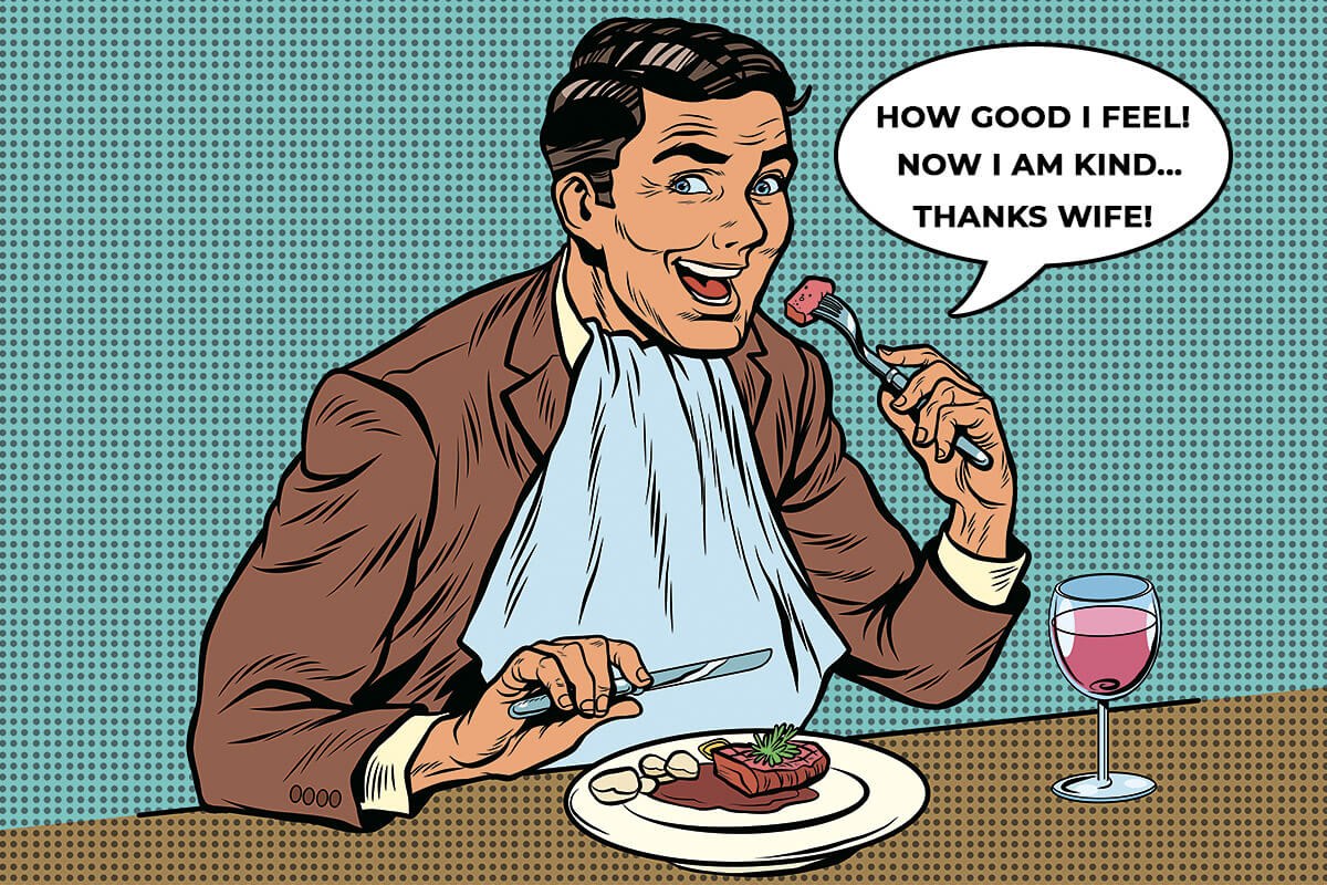Satisfied man eating meat steak