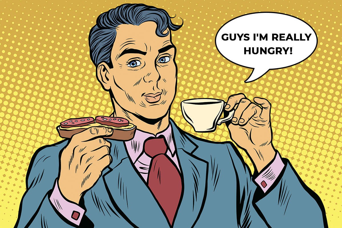 Hungry man with sandwich and cup of coffee