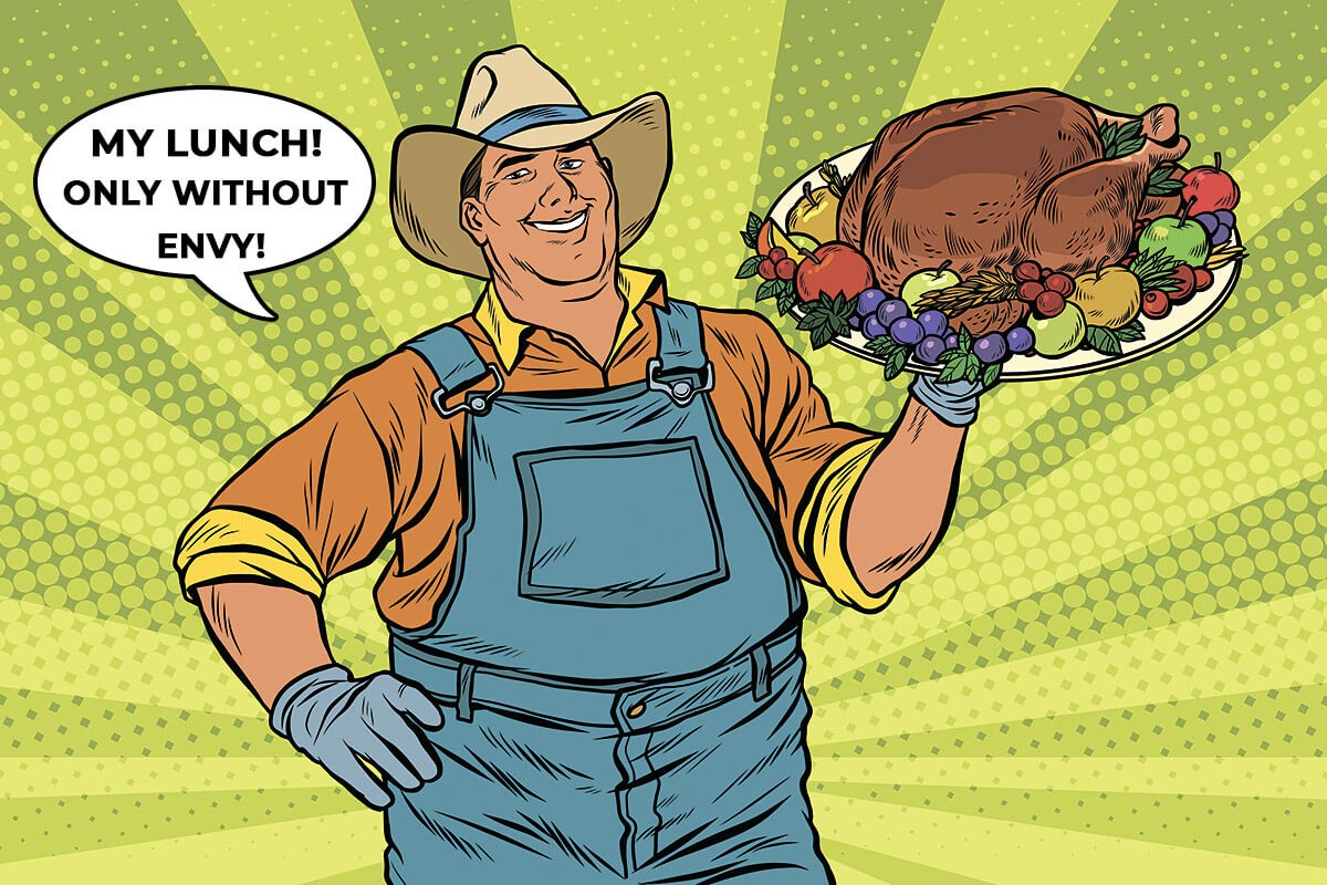 Cheerful man with roasted turkey on a tray
