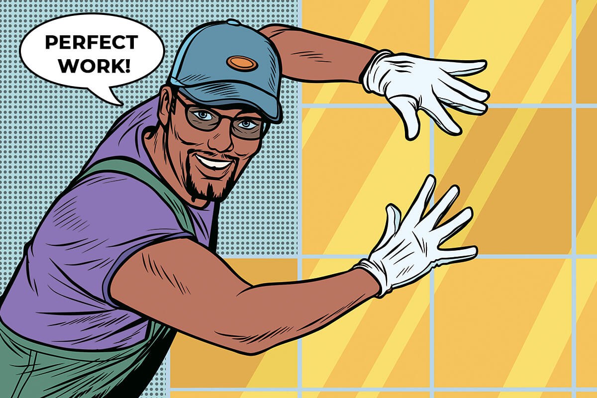 The tiler shows his skillful hands
