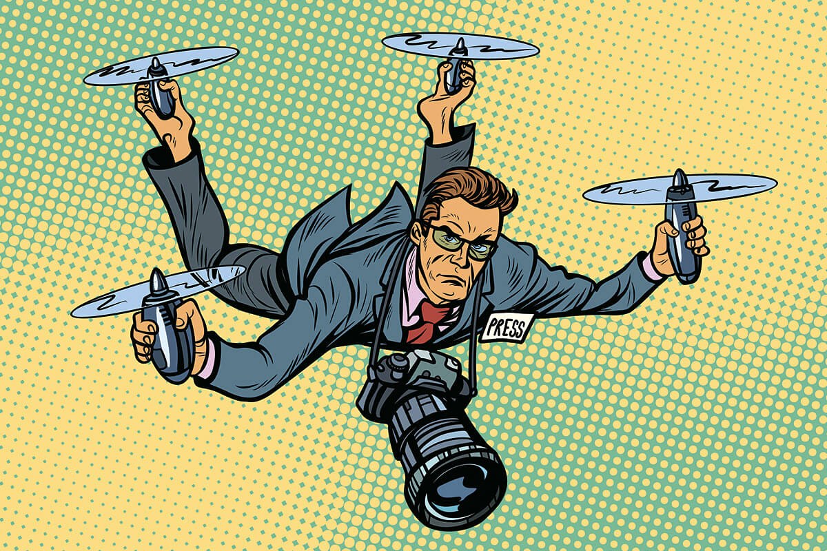 Picture of a professional reporter flying on drones