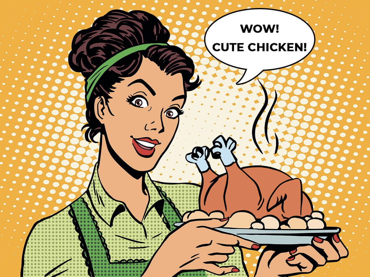 Picture of an attractive housewife with fresh fried chicken
