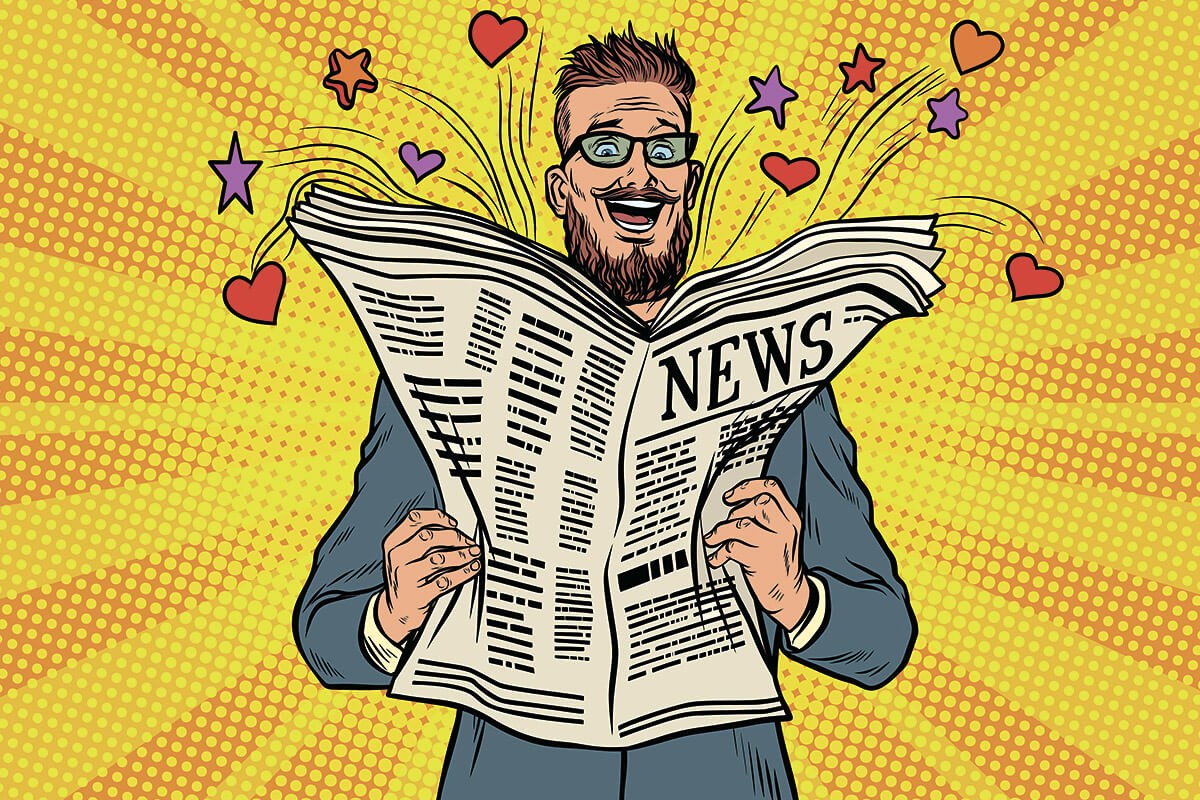 Cheerful man reading a news newspaper