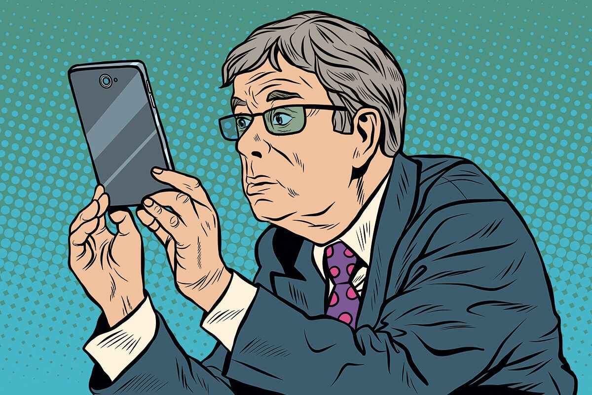 Picture of a man who looks at the tablet screen carefully Picture of a man who looks at the tablet screen carefully