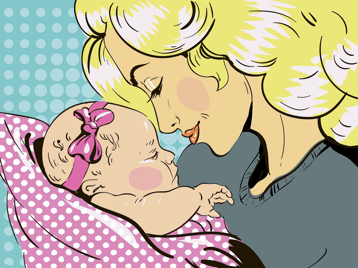 Picture of a mother kissing her newborn baby with love