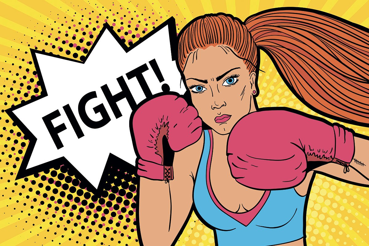 Picture of an athletic woman with boxing gloves