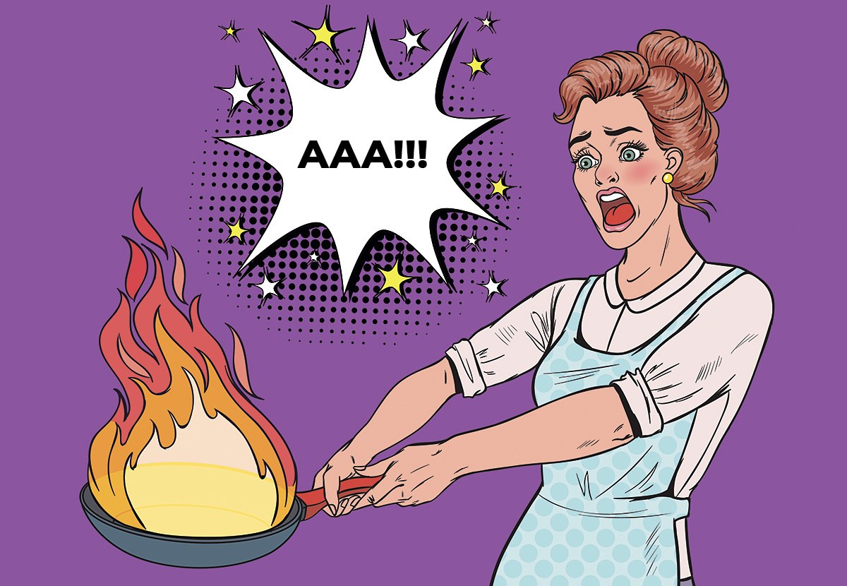 Picture of a screaming woman with a burning frying pan in her hands