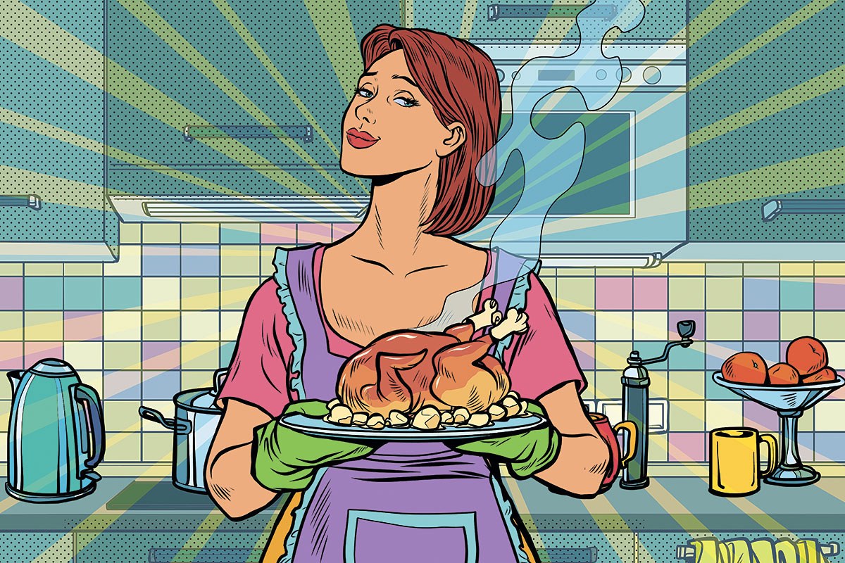 Picture of a cute housewife holding a deliciously cooked chicken
