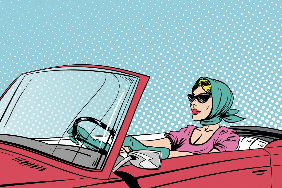 Picture of an attractive woman driving a car