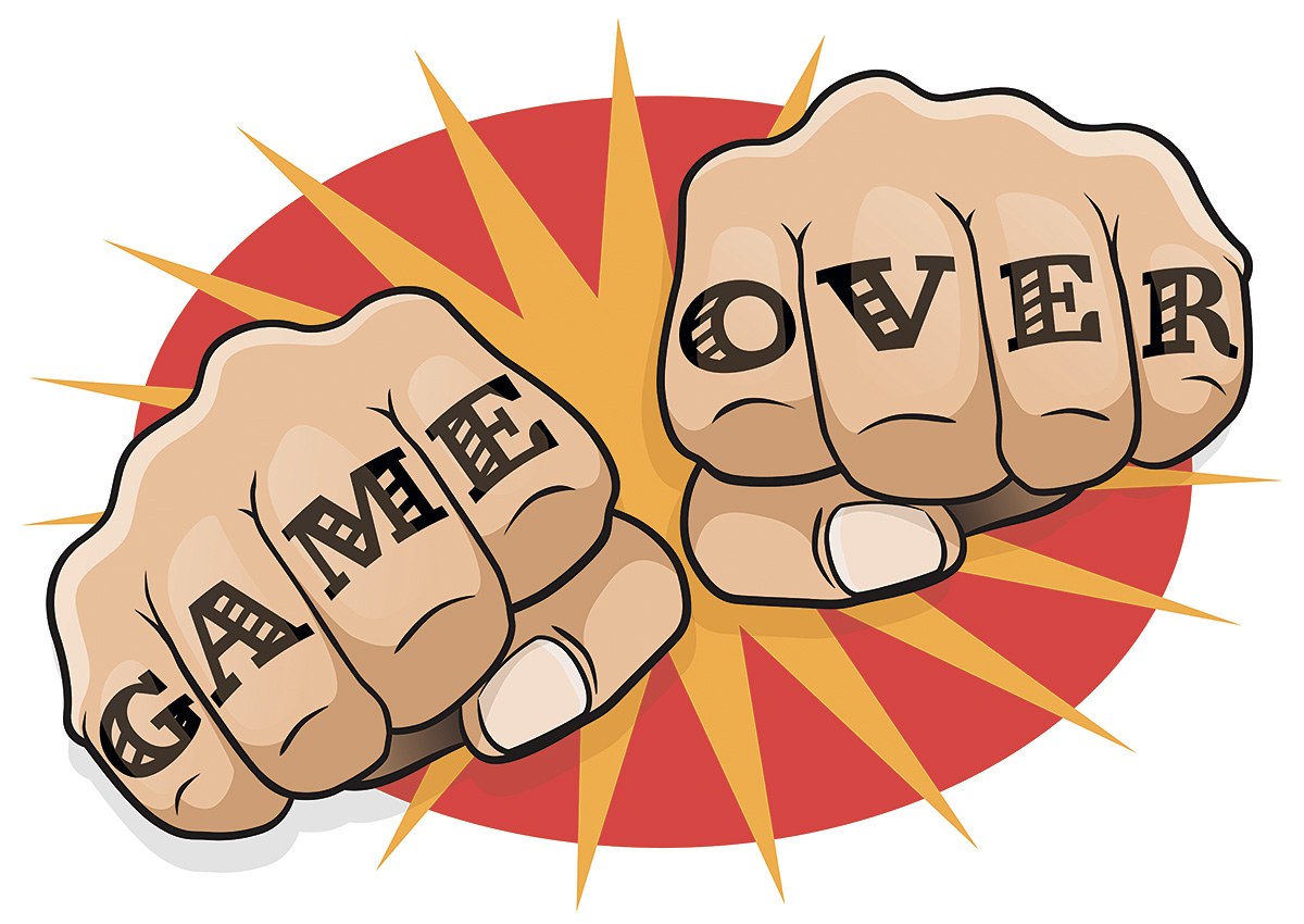 Picture of male fingers with a tattoo game over