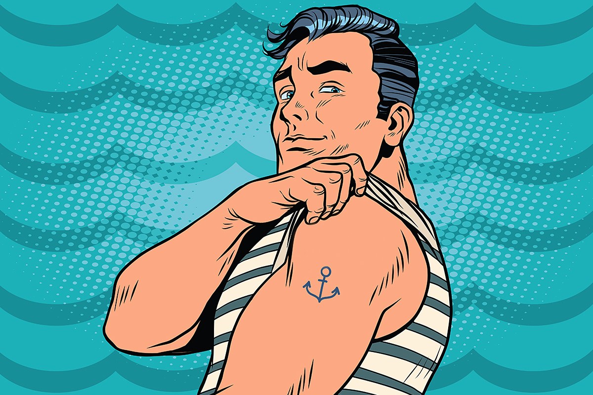 The sailor shows an anchor tattoo on his shoulder