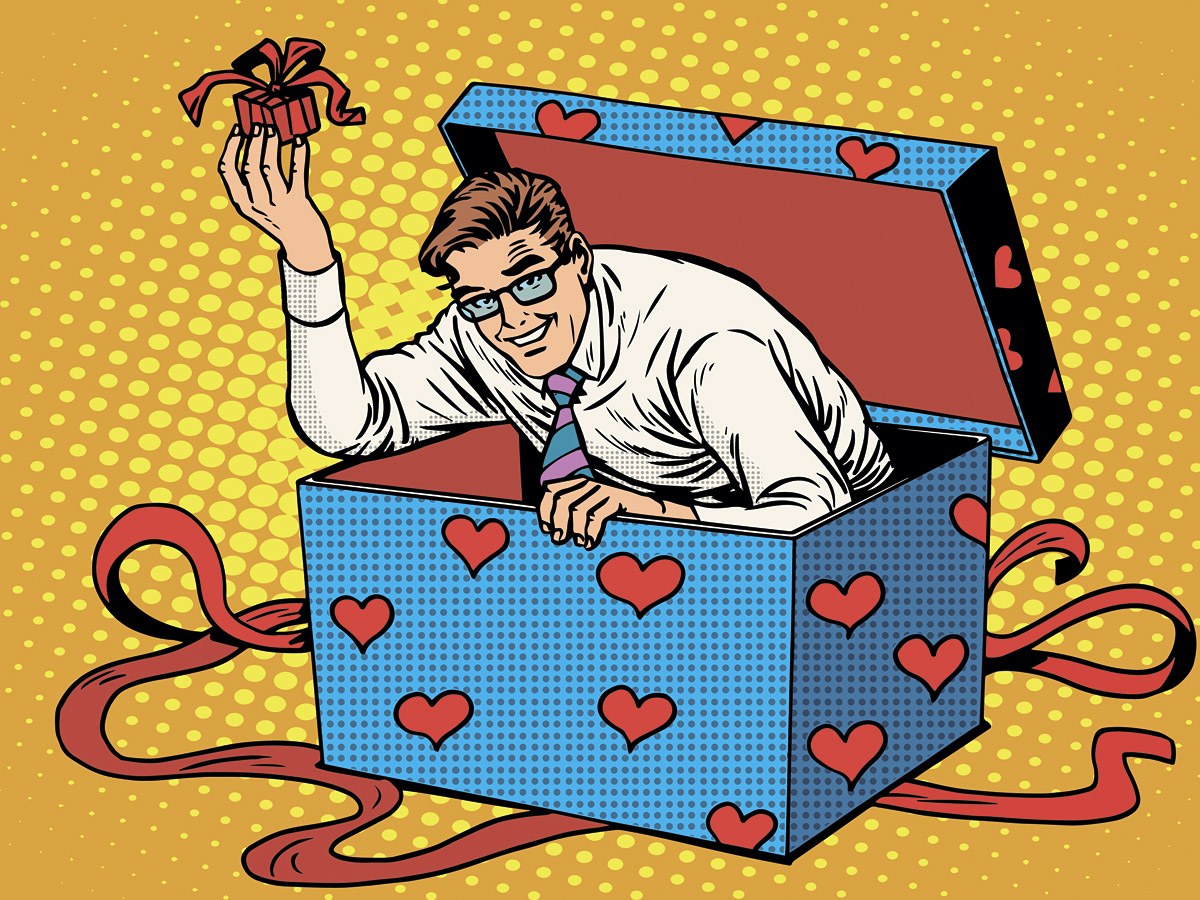 Man getting out of a gift box