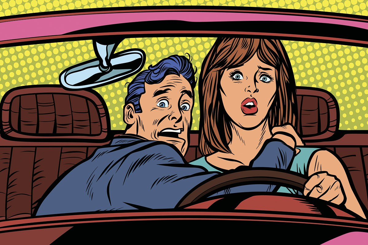 Picture of a frightened man with a woman driving a car