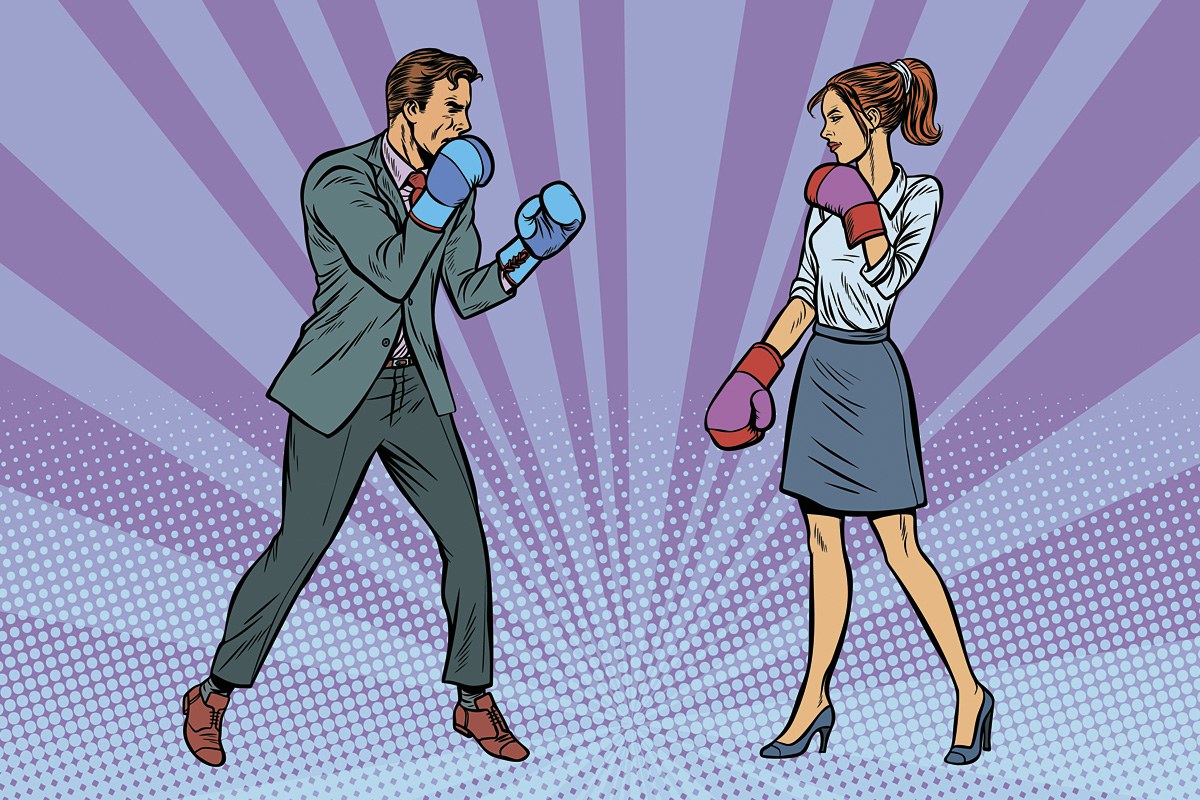 Man and woman with boxing gloves