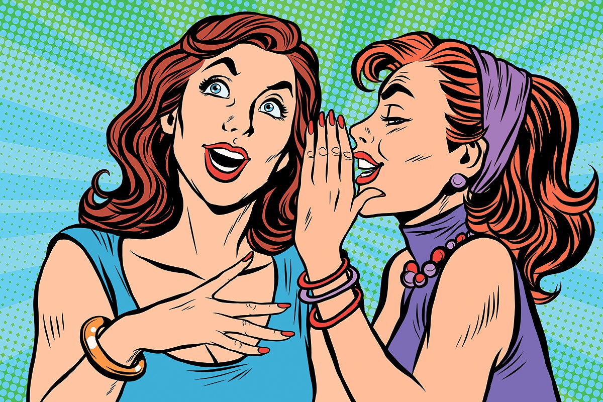 Two beautiful women gossip